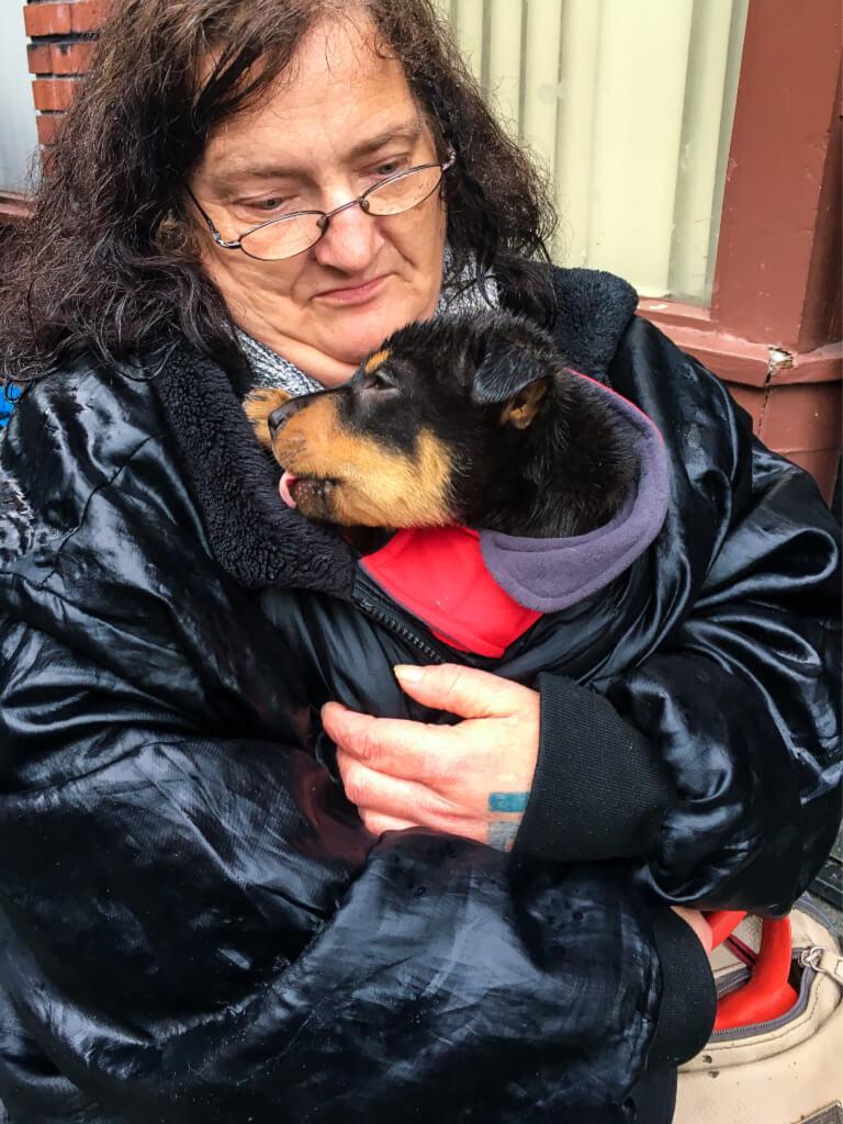 Client holding her puppy
